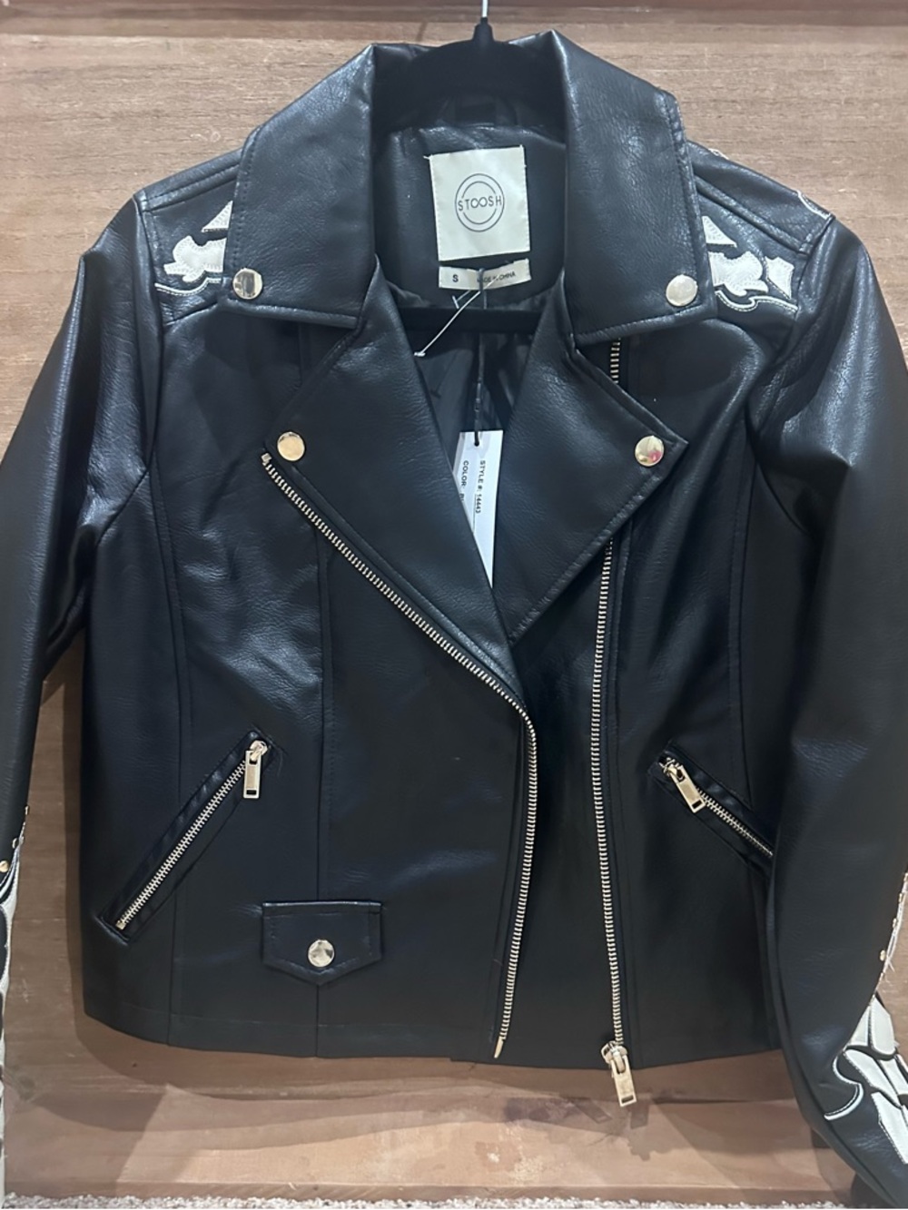 Stoosh Black Faux Leather Moto Jacket with White Embroidered Accents
